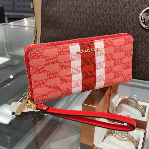 MICHAEL KORS Leather Continental Phone Holder Wristlet Wallet 
Dark Sungria
NWT